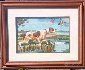 Quadri  eseguiti a punto croce.