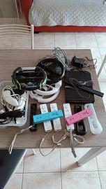 Wii nera con telecomando e volanti
