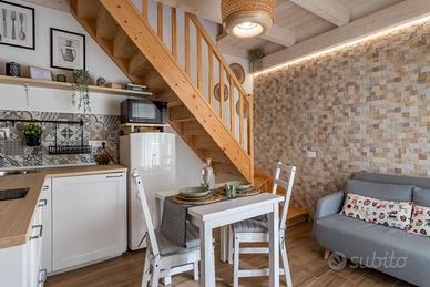 Grazioso loft con patio giardino posto auto 