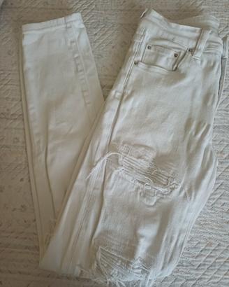 Jeans strappati bianchi uomo taglia S