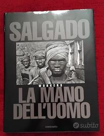 VENDUTO. fotografico  La mano dell'uomo S. Salgado