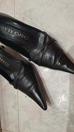 tacchi neri pitti oro
