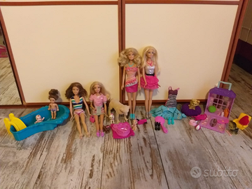 4 barbie con accessori e vestiti