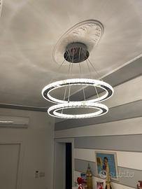 Lampadario acciaio led luce calda