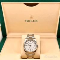 Rolex ref 116000 36mm acciaio dial bianco.