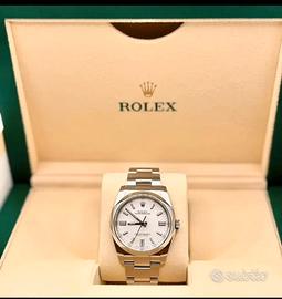 Rolex ref 116000 36mm acciaio dial bianco.