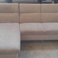 divano letto L colore grigio chiaro 