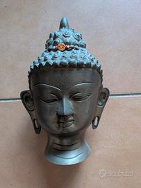 statua testa di Buddha in bronzo Thailandia India
