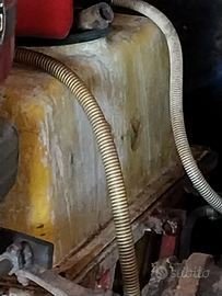 Trattore più attrezzi in blocco