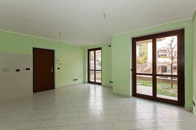 appartamento trilocale con giardino privato