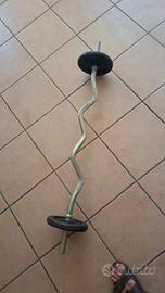 Bilanciere con due dischi da 5 kg e ferma  dischi