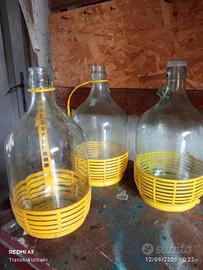 tre bottiglie porta vino o porta olio in vetro 