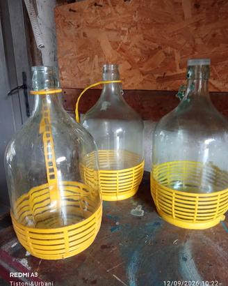 tre bottiglie porta vino o porta olio in vetro 