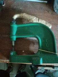 Torchietto per bottoni 