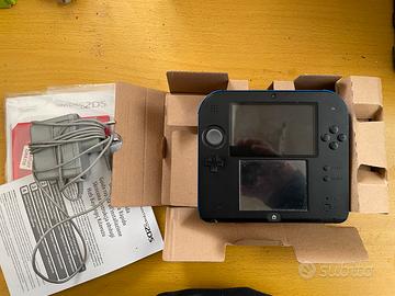 Lotto : Console Nintendo 2DS + giochi e custodia