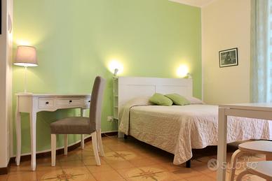 Camera indipendente con angolo cottura e bagno