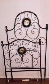 Lettino antico in ferro battuto