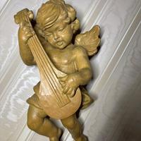 Putti in legno