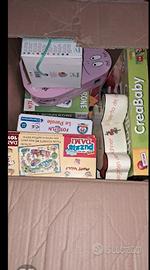 scatola con 8 puzzle per piccini