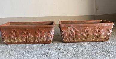 vasi da fiore in terra cotta con decori