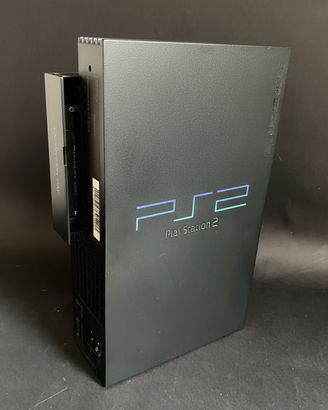 PS2. Buono stato. Non legge dischi + 2 controller