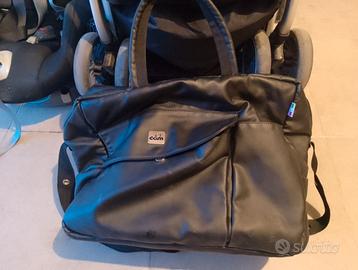 Seggiolino auto, passeggino e borsa