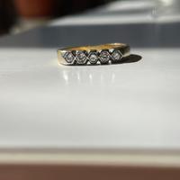 Anello oro 18k con 5 diamanti