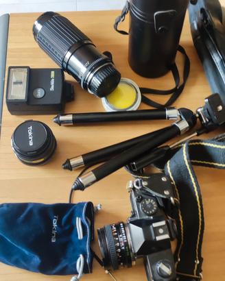 zoom, obbiettivi, macchina fotografica ecc ecc 