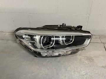 Faro LED destro BMW Serie 1 F40 – plastica rotta