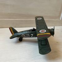 Giocattolo aereo in legno e latta, vintage.