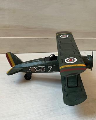 Giocattolo aereo in legno e latta, vintage.