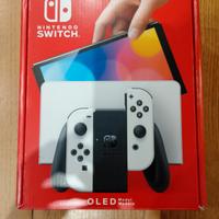 Nintendo Switch OLED Bianca + 3 Giochi Mario