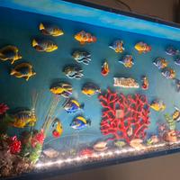 acquario con pesci in ceramica illuminato 