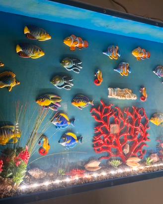 acquario con pesci in ceramica illuminato 