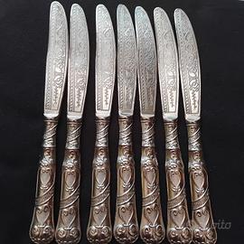 Set 7 coltelli vintage stile argento (384g)