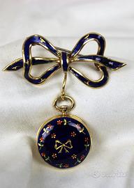 Spilla portafoto in oro 750 e smalti