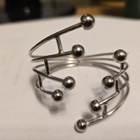 Bracciale rigido in ottone argentato anni 70