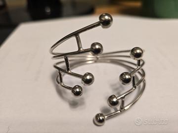 Bracciale rigido in ottone argentato anni 70