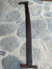 Taglia alberi (prima della motosega)