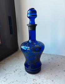 bottiglia da liquore vintage in vetro blu cobalto