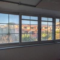 Finestrone scorrevole e fisso con zanzariera 