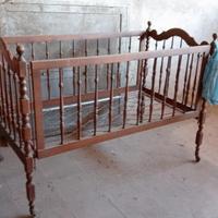 Culletta bimbo elegante in legno