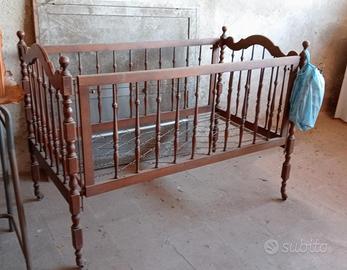 Culletta bimbo elegante in legno