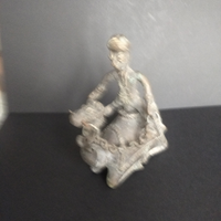Scultura in bronzo cammello con cavaliere