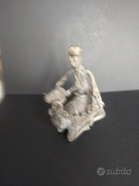 Scultura in bronzo cammello con cavaliere