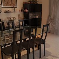 soggiorno laccato nero con tavolo vetro