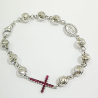 Bracciali rosario oro bianco diamanti e runini