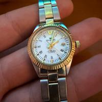 orologio oro e acciaio 