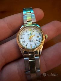 orologio oro e acciaio 