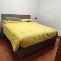 Letto contenitore matrimoniale e comodini